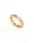 Gold ring with small diamonds on a white background