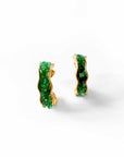 Pair of green stone earrings on a white background
