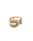 Gold ring with gemstones on a white background