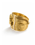 Gold ring with pearls on a white background