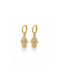 Gold hamsa hand earrings on a white background