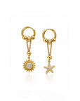 Gold earrings with sun and star designs on a white background