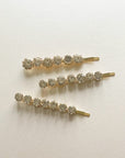 Discover the elegance of the Adalynne Hair Slide Set, a collection of luxury hair slides featuring exquisite designs and luxurious tones. Elevate your hairstyle with these sophisticated accessories that embody elegance and style. Explore the beauty of luxe tones and adorn your hair with the perfect finishing touch.