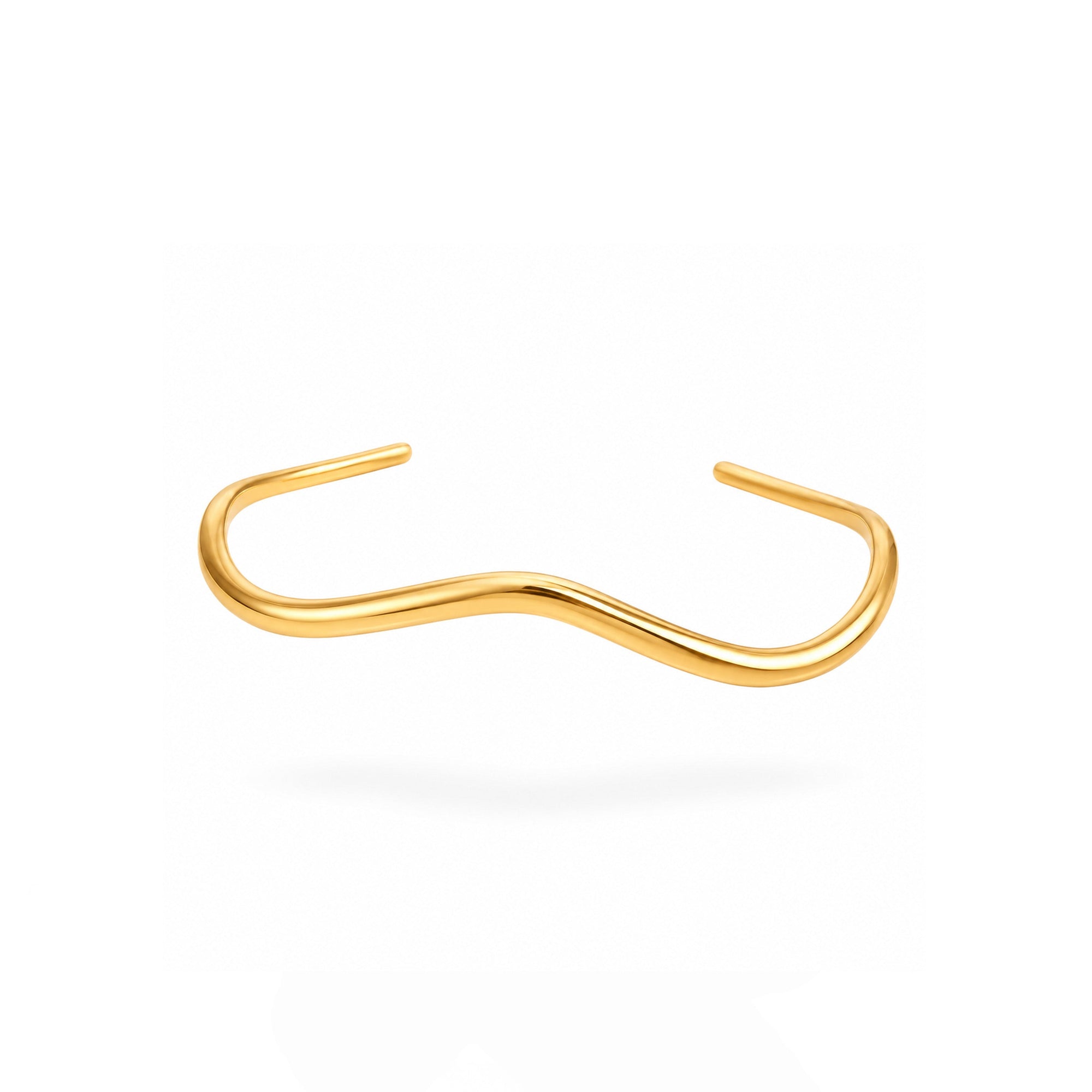 Gold nose ring on a white background