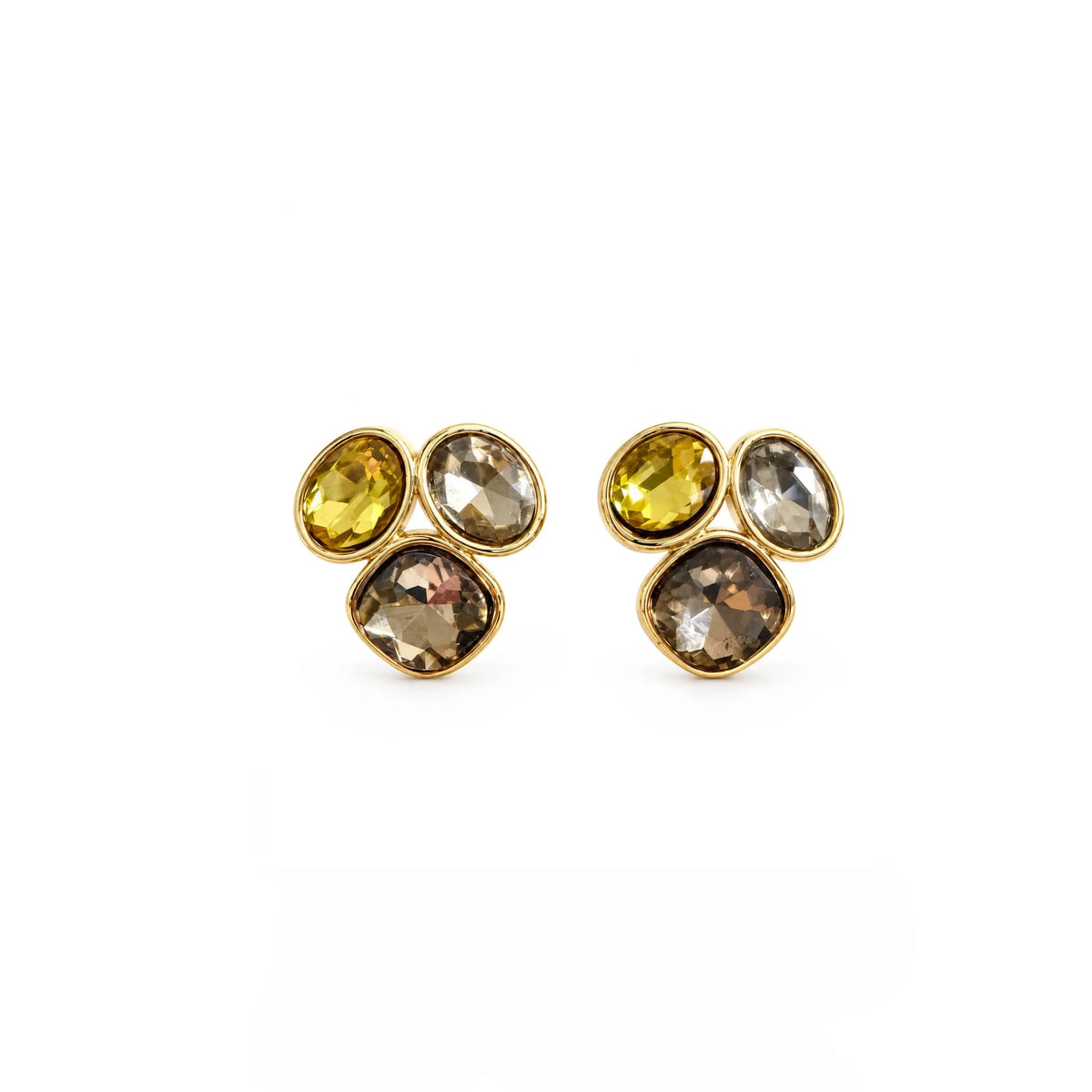 A pair of gold stud earrings featuring three oval gemstones each, with one yellow stone, one clear stone, and one smoky brown stone, set against a plain white background.