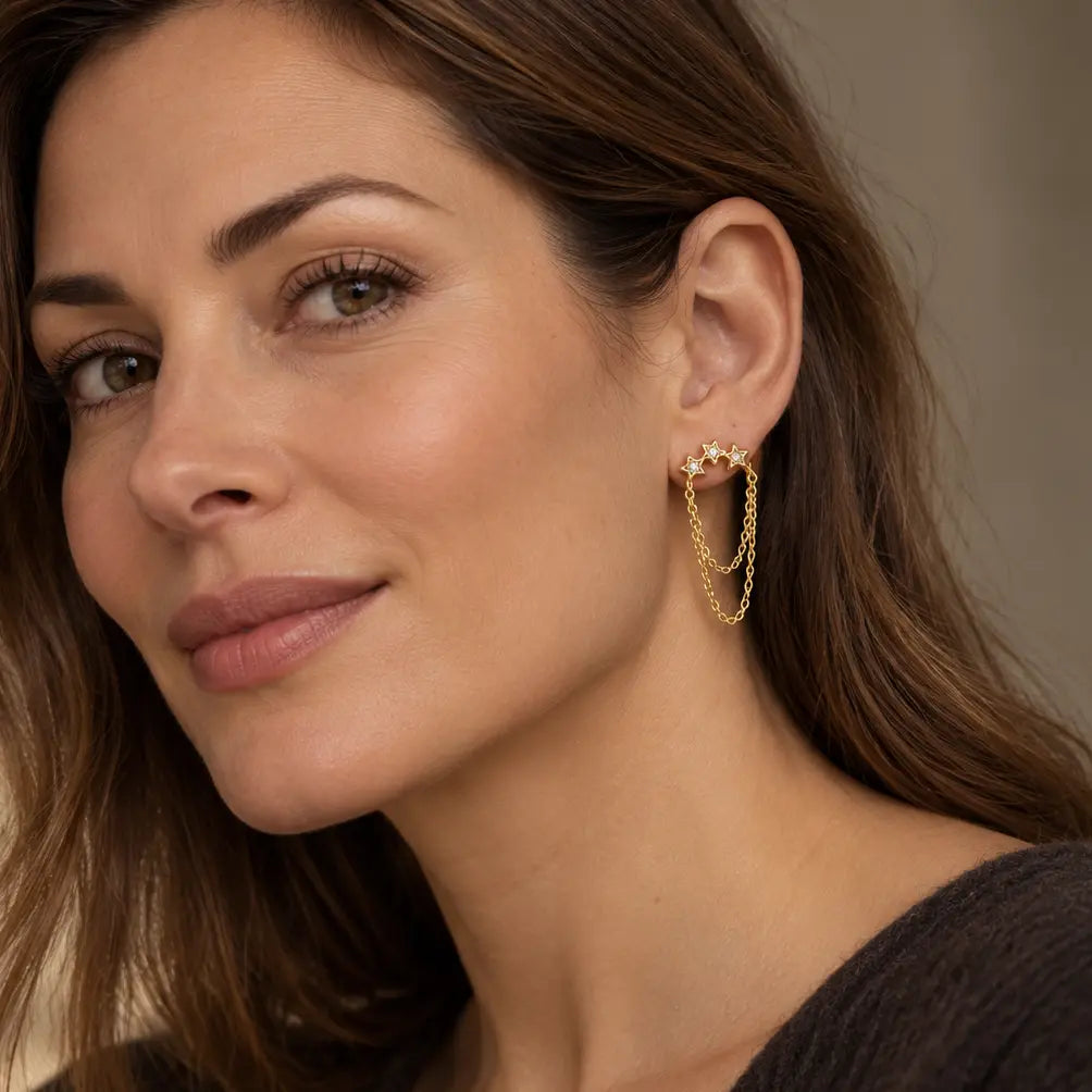Hesperia Luxe Gold Plated Crystal Star Chain Drop Earrings Luxe Tones