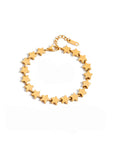 Gold star bracelet on a white background