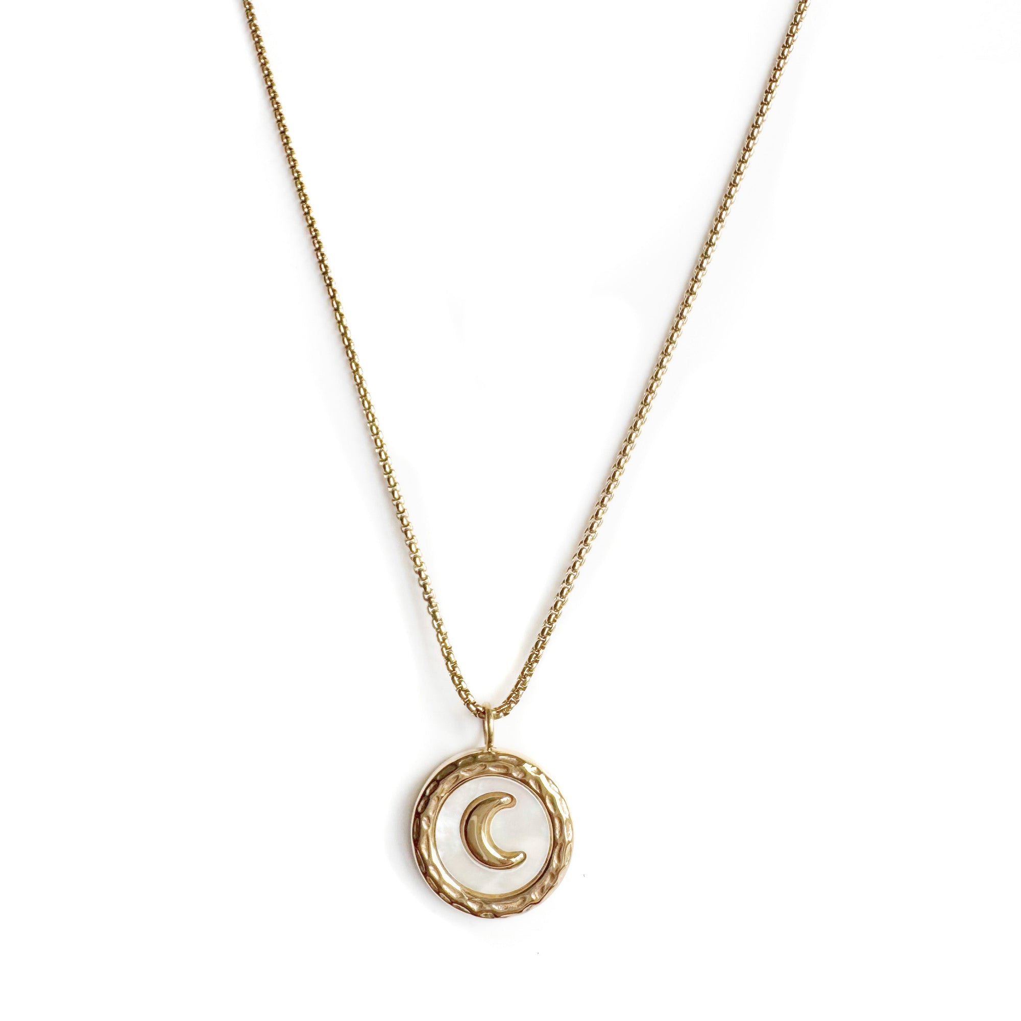 Necklace with a moon pendant on a white background
