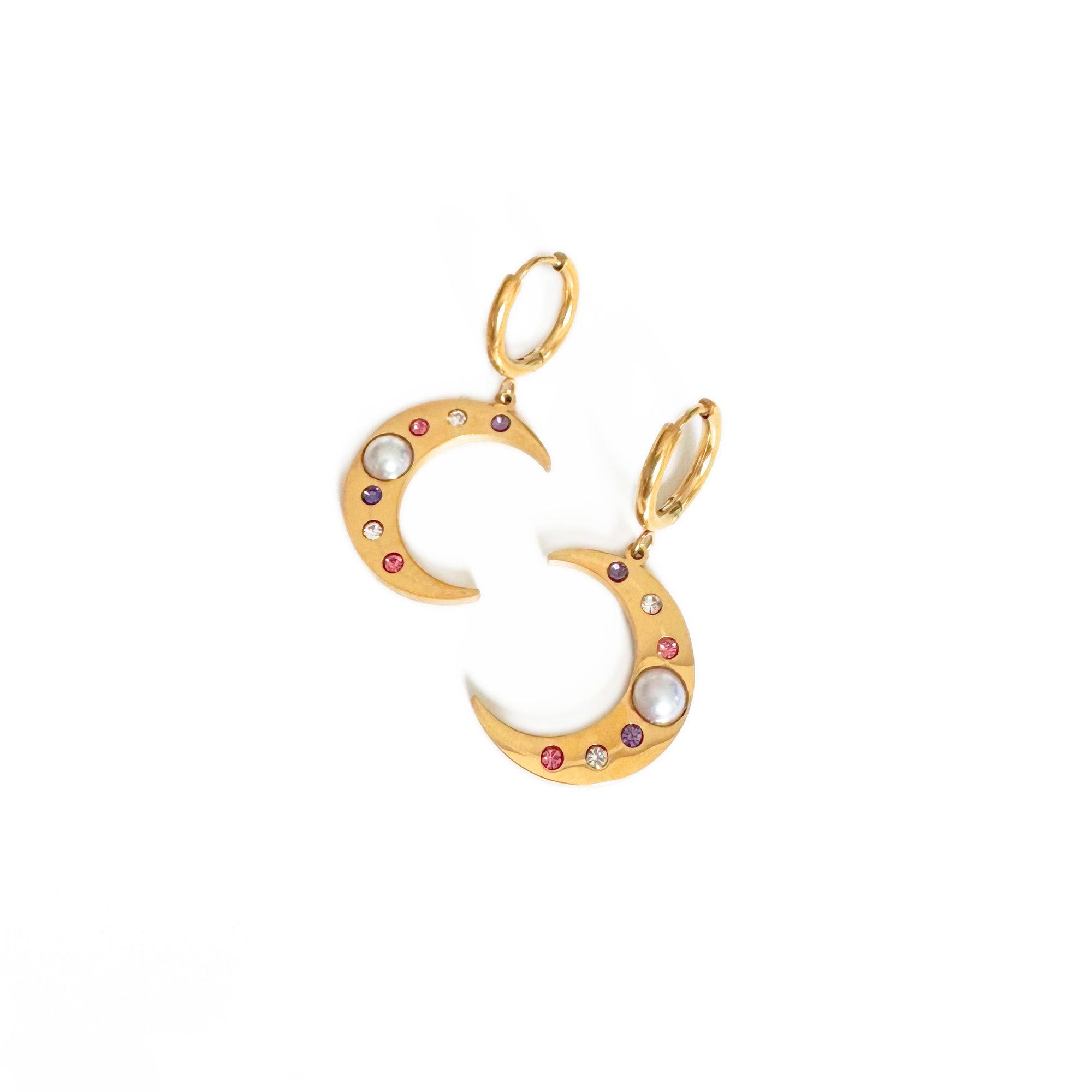 Gold letter 'S' earrings with colorful stones on a white background