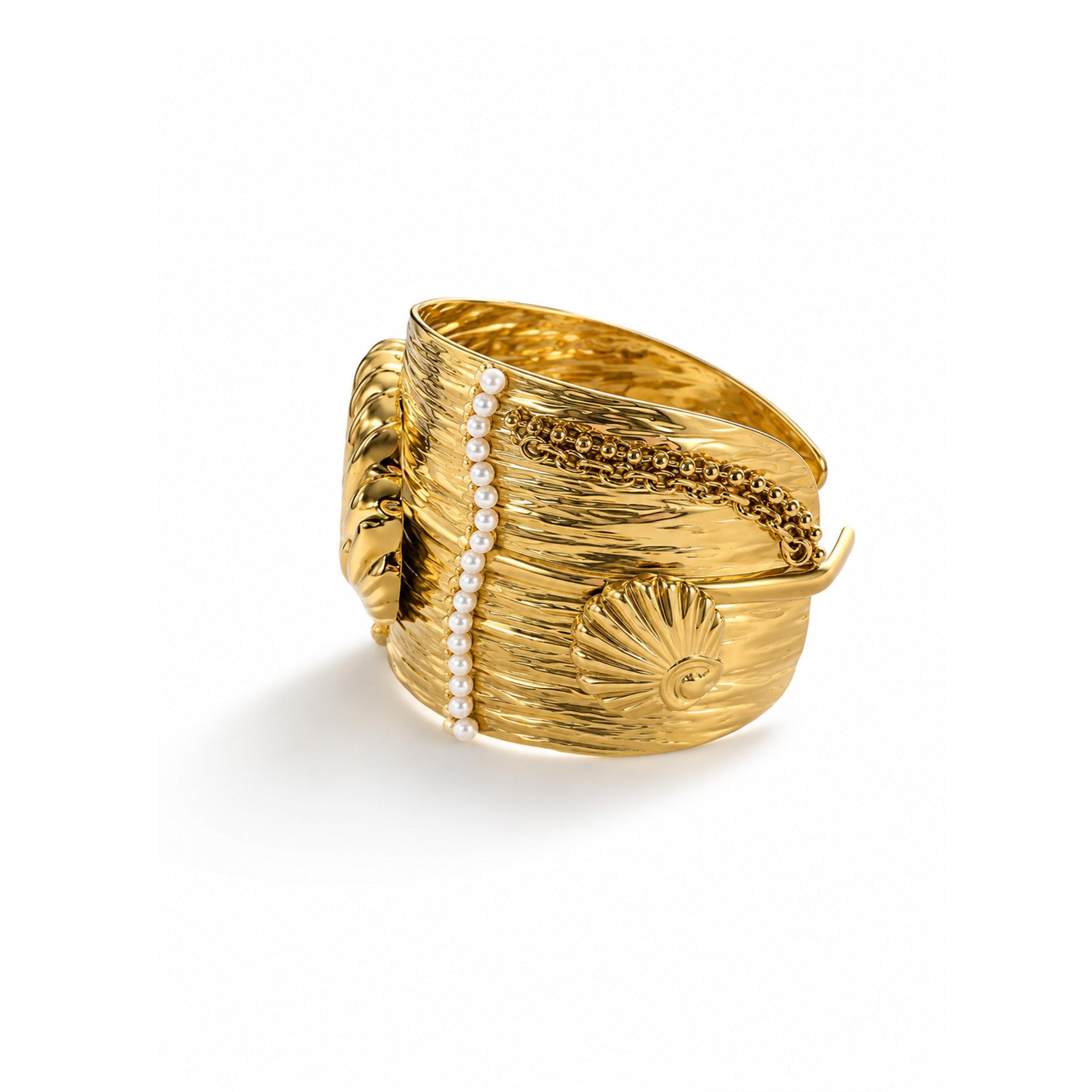 Gold ring with pearls on a white background