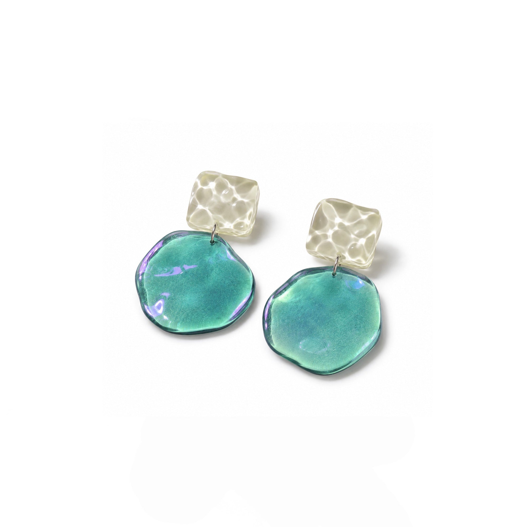 Pair of earrings with green and clear gemstones on a white background