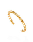 Gold spiral ring on a white background