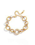 Gold and white chain bracelet on a white background