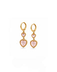 Heart-shaped pink earrings with gold accents on a white background