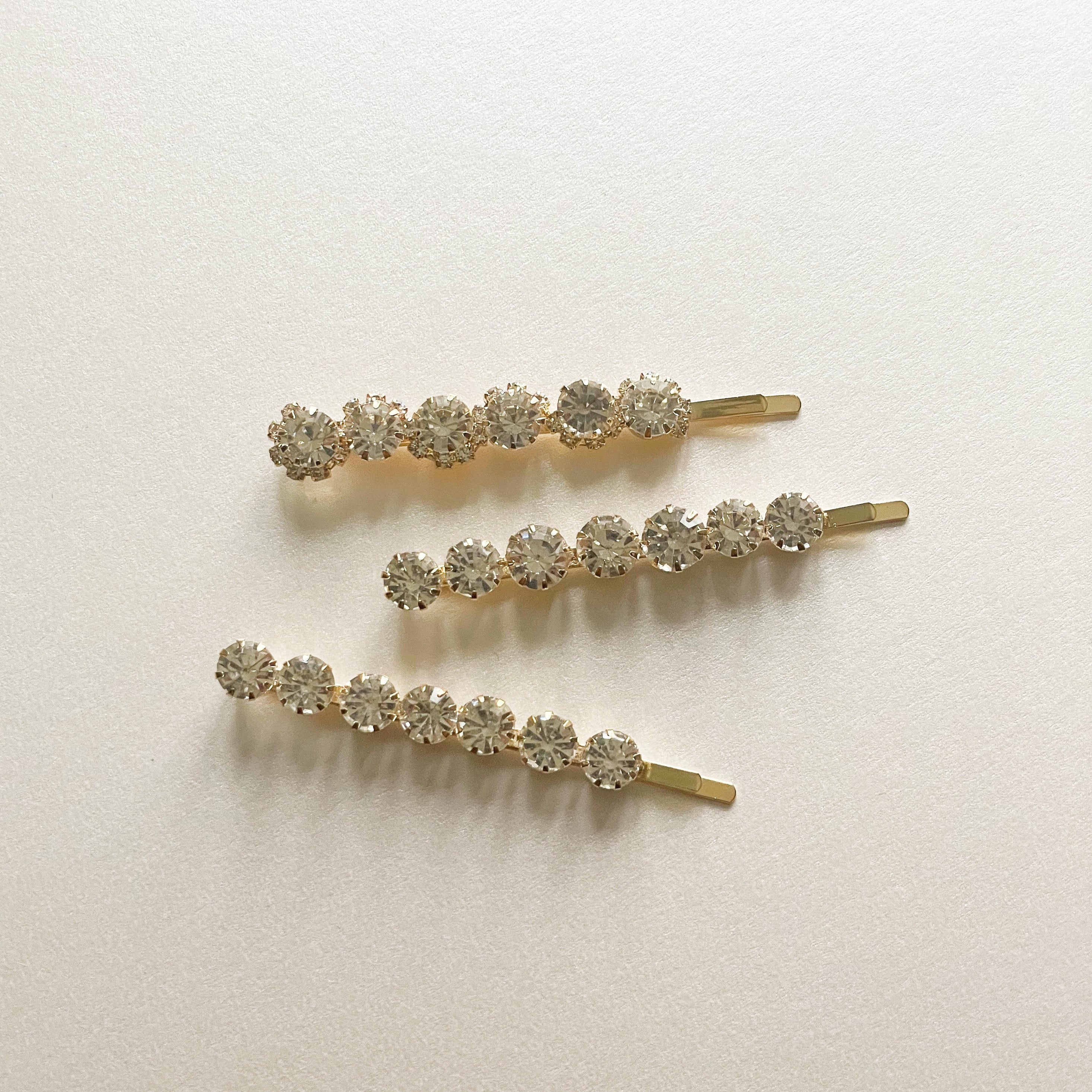 Discover the elegance of the Adalynne Hair Slide Set, a collection of luxury hair slides featuring exquisite designs and luxurious tones. Elevate your hairstyle with these sophisticated accessories that embody elegance and style. Explore the beauty of luxe tones and adorn your hair with the perfect finishing touch.
